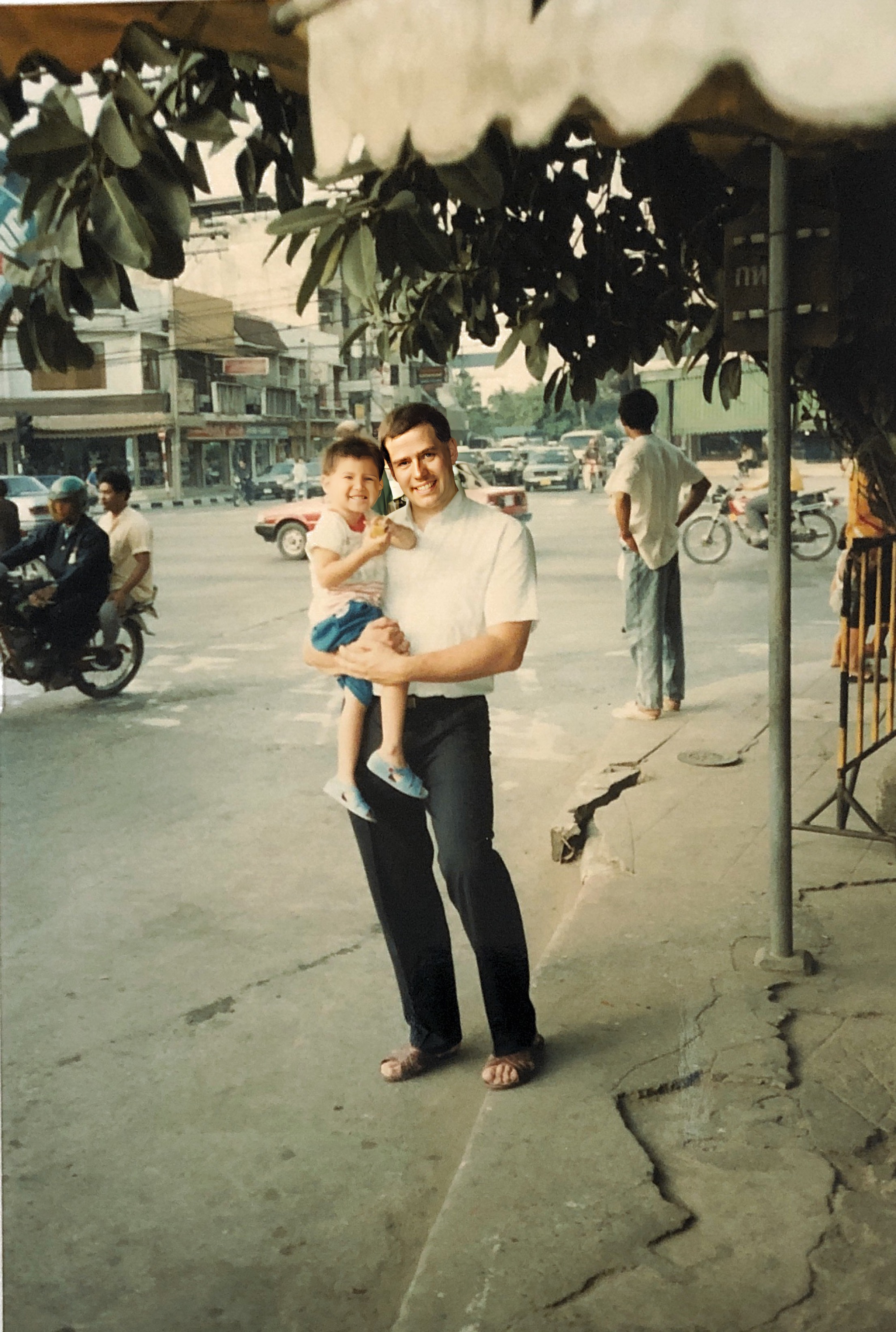 My son and i on a corner in Bangkok 1987