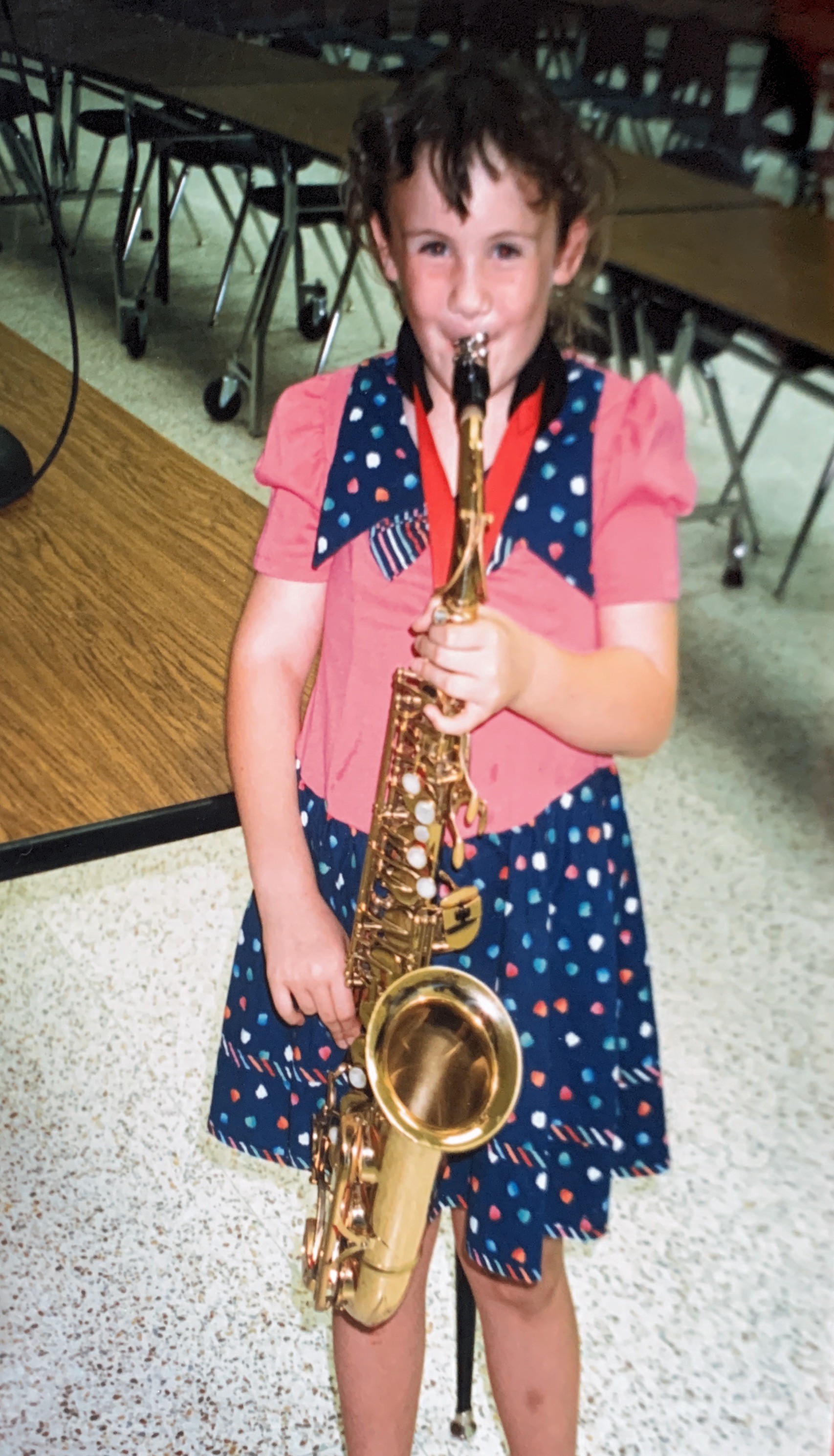 Playing on Kristi’s saxophone after a band concert 1994