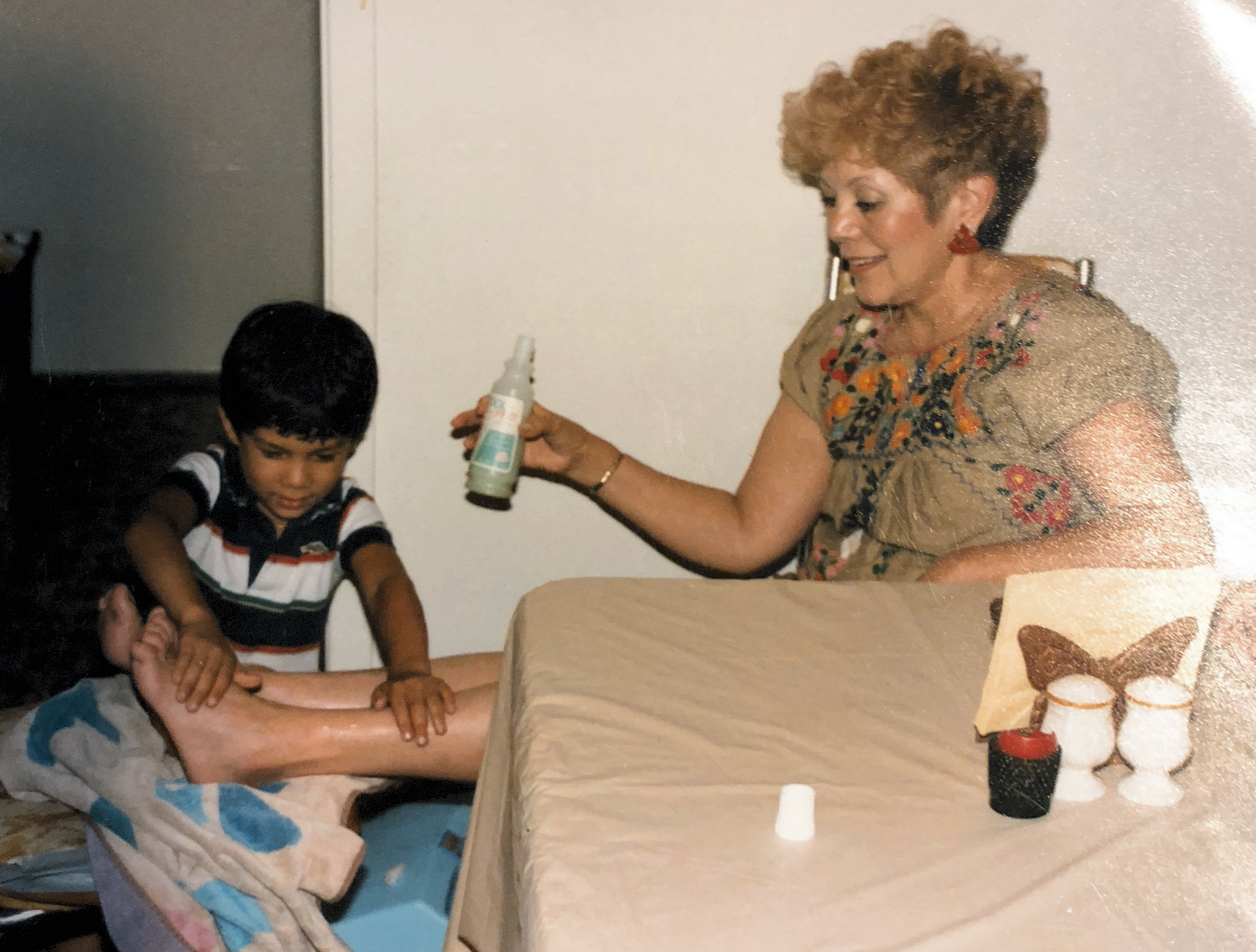 Sal N Vera (3 yrs old) massaging his cousin Jeanette vandeWeghe’s feet! 1983