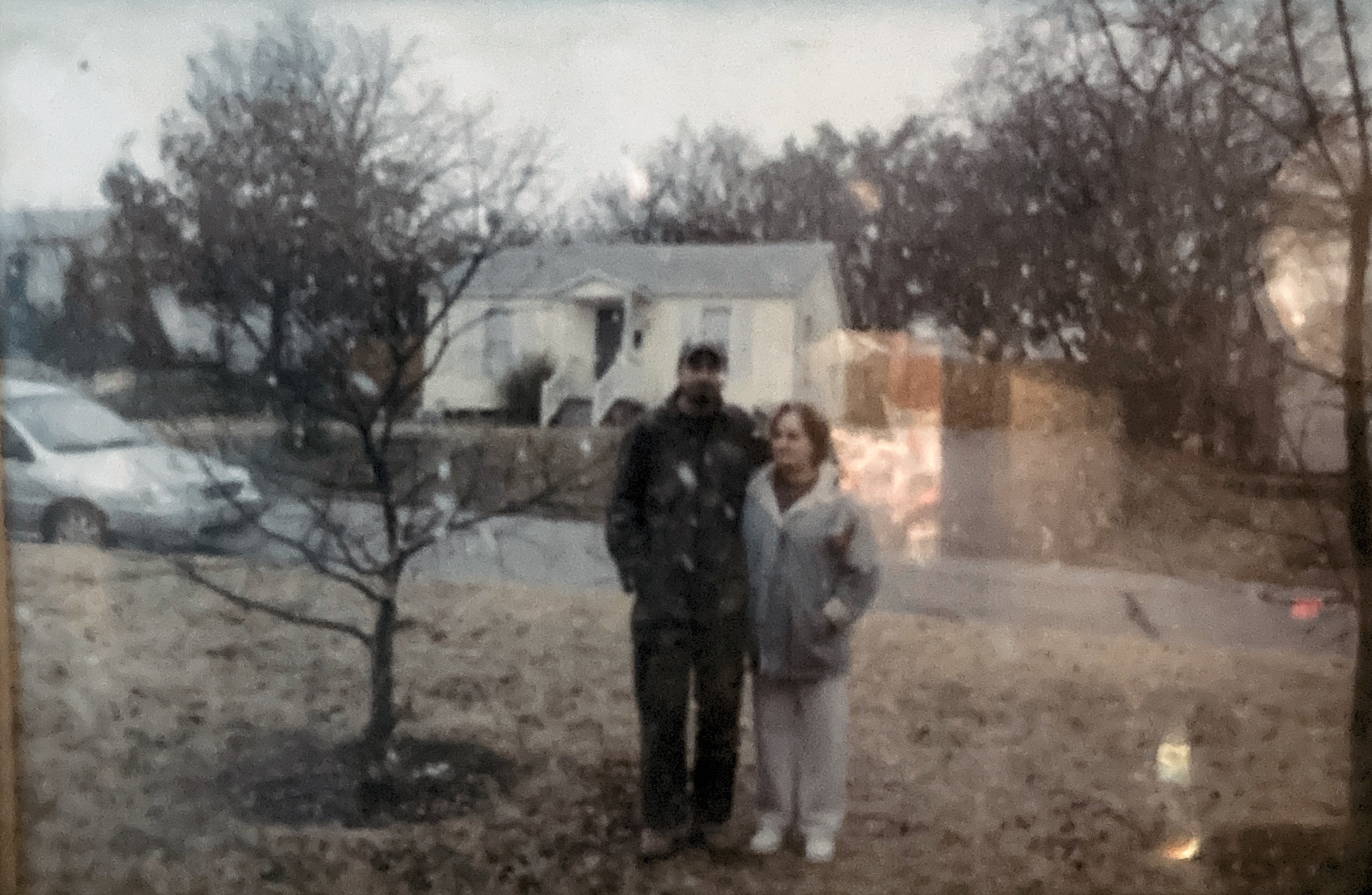 It was winter of 2018 me and my momma standing in fromt of my house as snow flakes fell on us