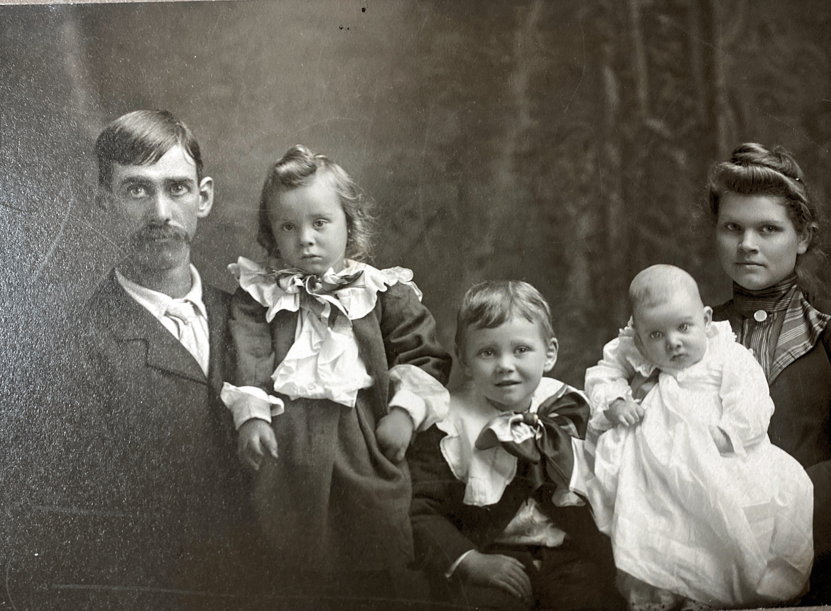 My McKay grandparents with my uncles, Ralph, Harold, and Glenn. Taken sometime before 1908, when my father was born