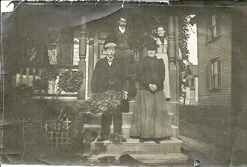 My grandparents (back row) with visiting neighbors at 427 Spooner, Plainfield NJ 1899
