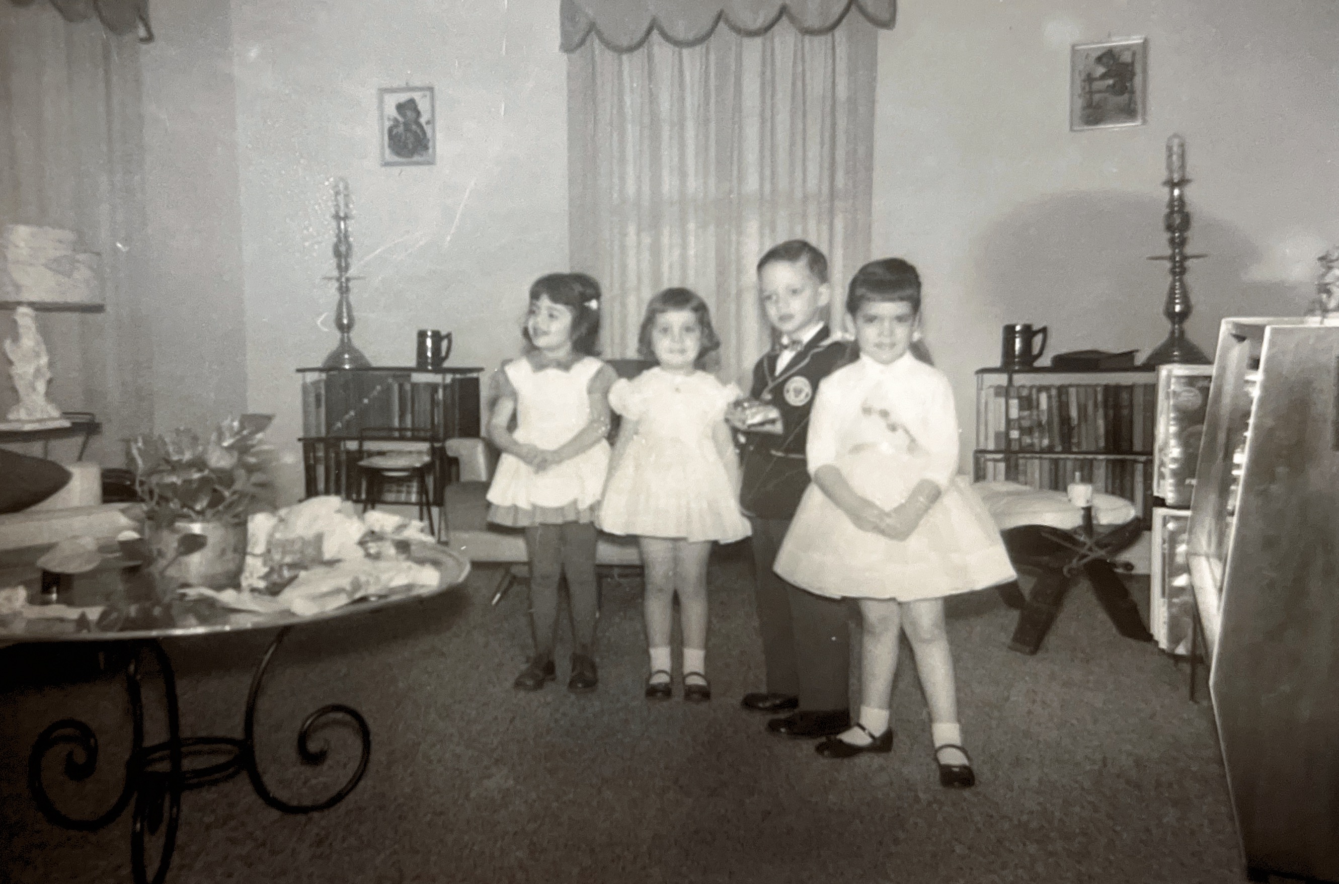 A birthday party c. 1960 when our parents ensured that we were well-behaved and proper.