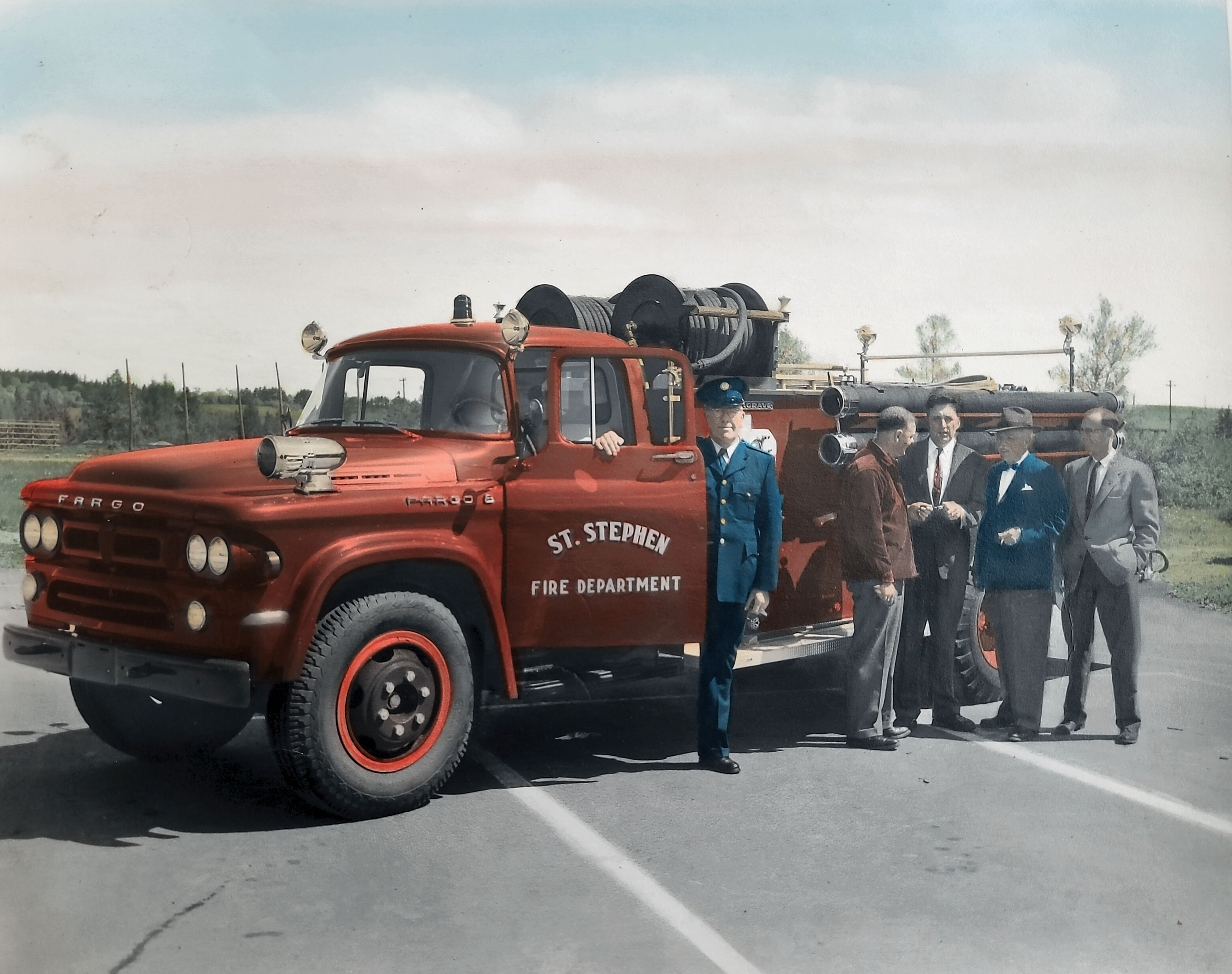 1957 - New fire truck for St. Stephen, NB, Canada. In the photo: Ray Burns, Driver. Jack Woodcock, Plymouth-Fargo Dealer, Raymond Day, Chairman of the Fire Committee. Carl Brown, Mayor. Stan Smythe, Councilor, Fire & Police. Committee