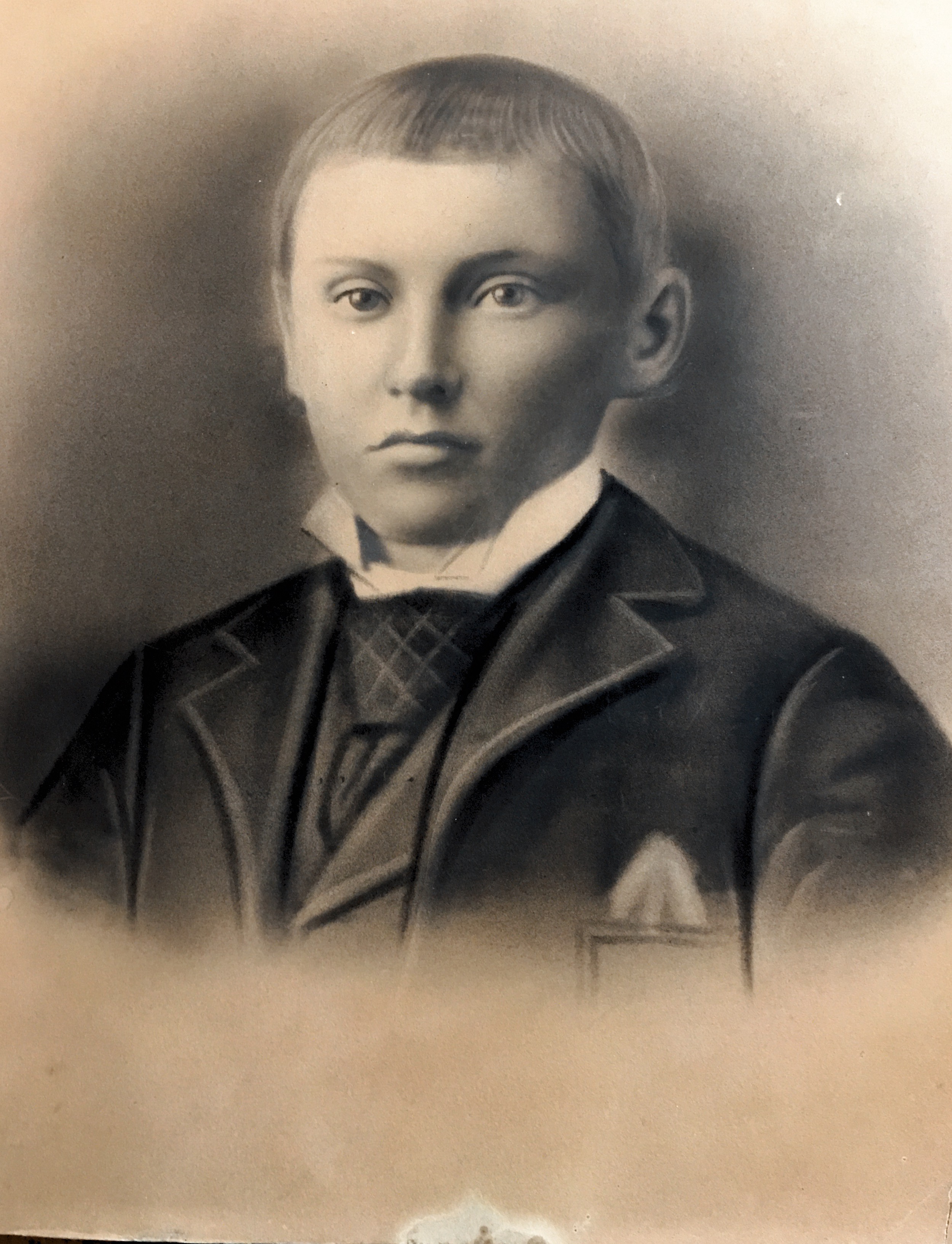 This is my grandfather. Believed taken when he was 13-15. Taken about 1894.