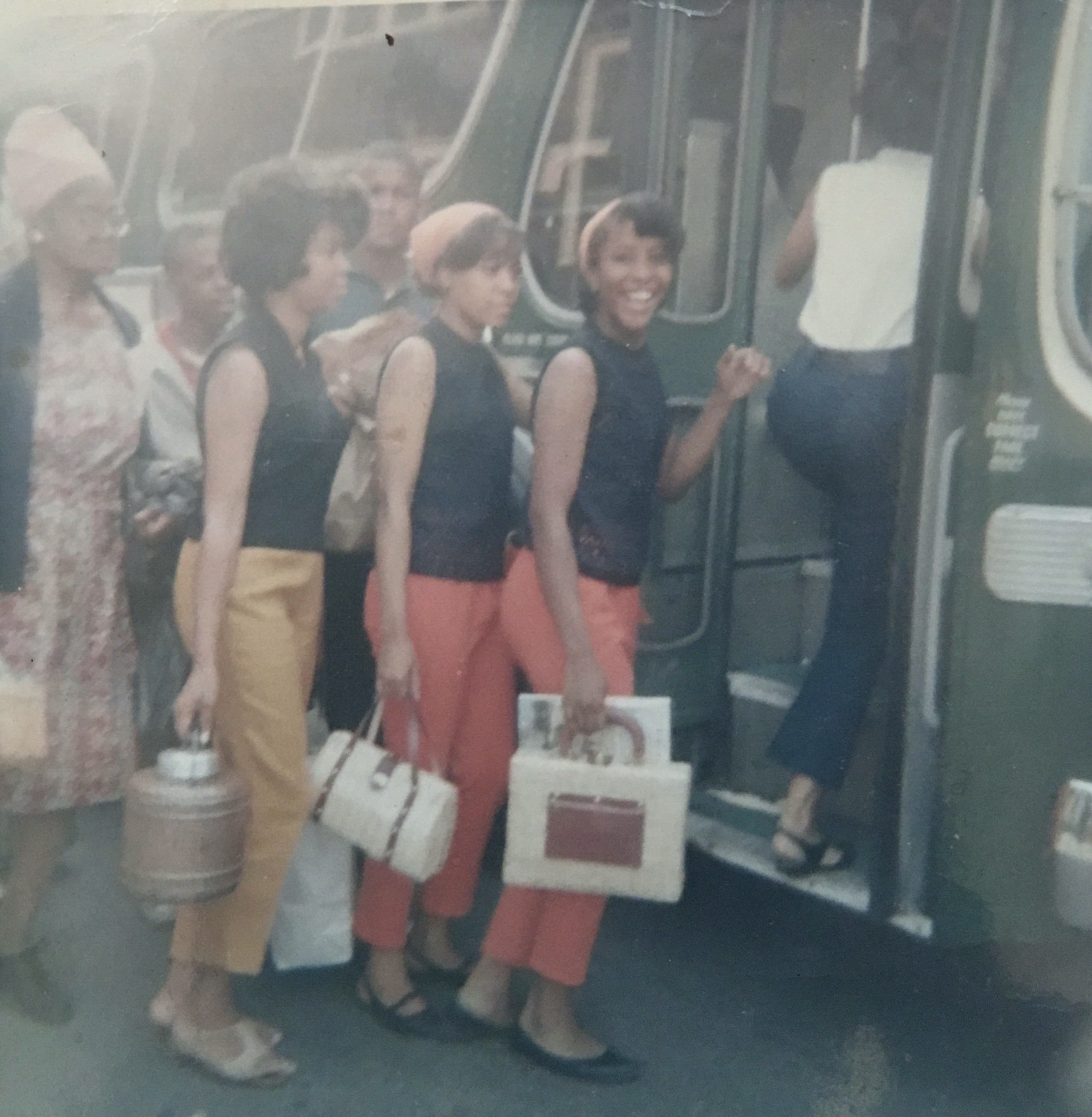 Mrs Rosa Tanner,Lignon Young, Linda Fuller and me boarding a bus either for our choir trip to Atlanta Ga or to the annual church picnic on. Belle Isle. I can’t tell if the year is 1963,1965 or 1966 lol