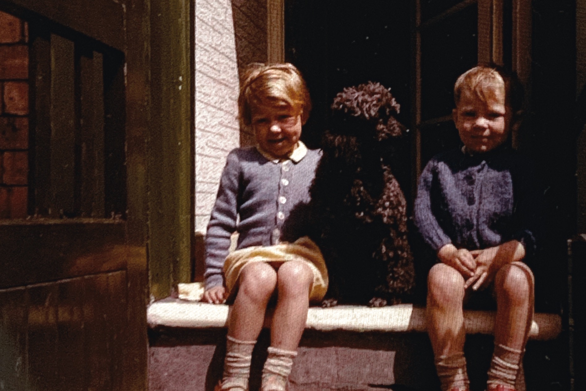 Leigh Nicholson Martin Nicholson and our Black Poodle about 1961 ?