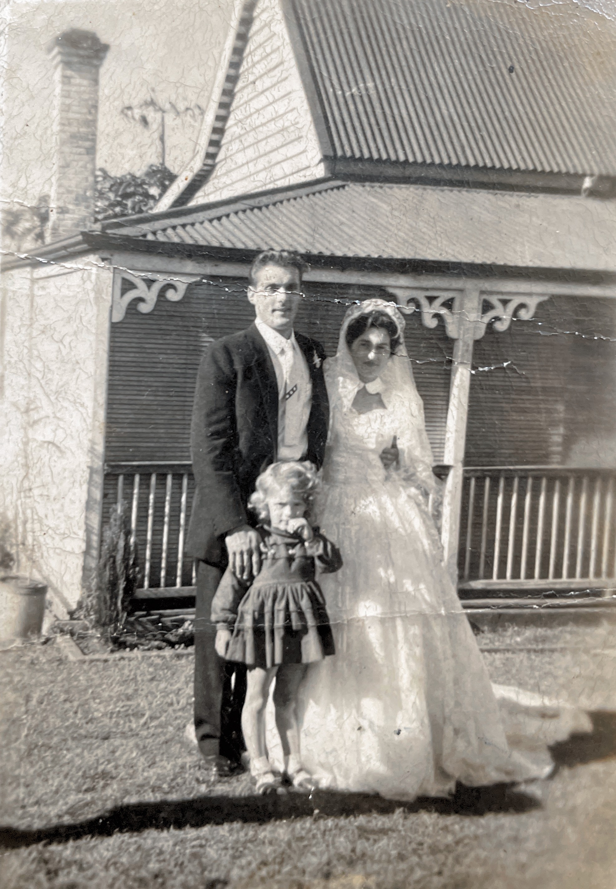 Mum and Dad outside Nana’s house after their wedding, May 1958. Dianne, Lucy’s daughter, is the little girl in front.