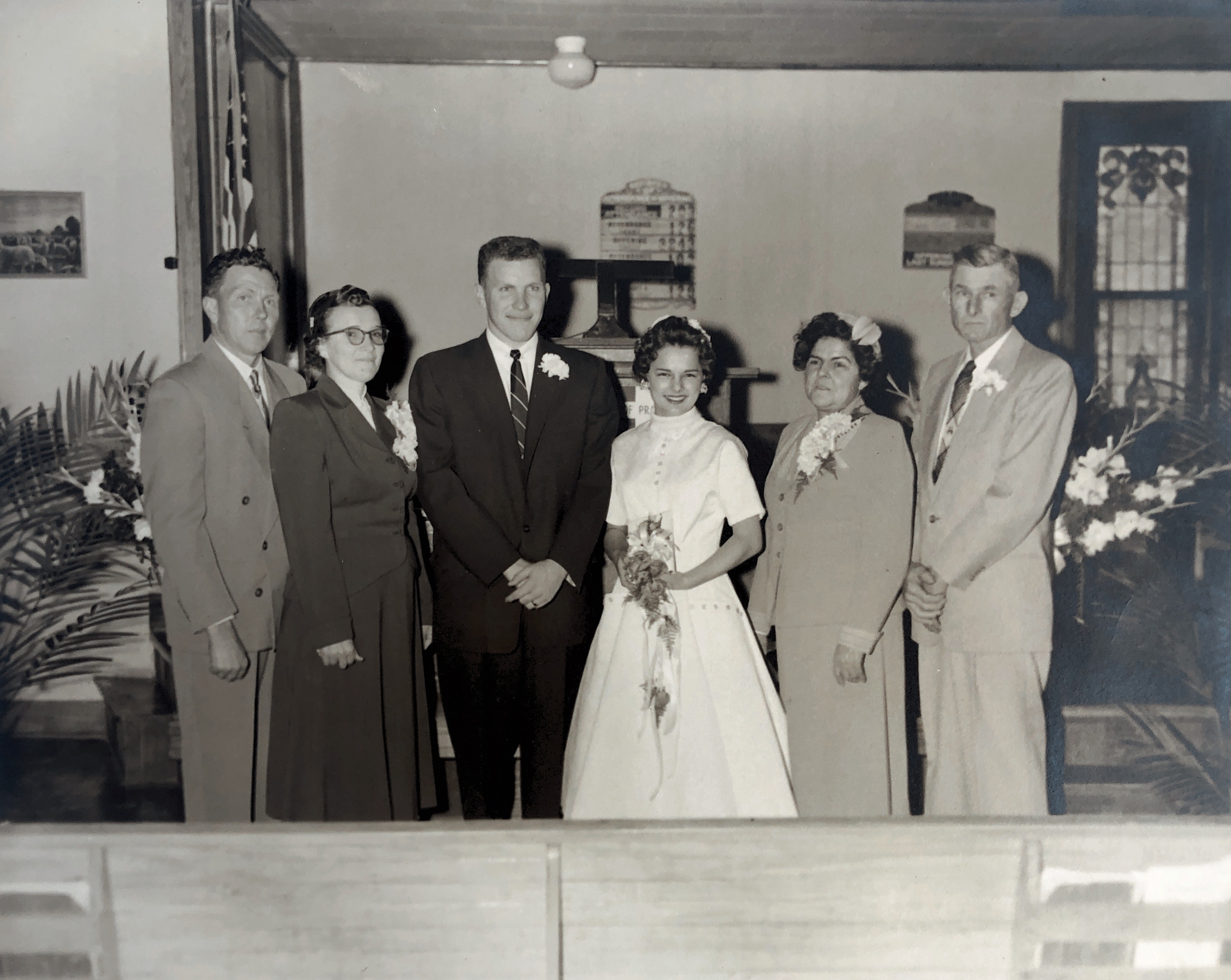 Jeri Kyle Adkins wed Jim Adkins. Left to right: Raymond V. Adkins, Vivian N Adkins, Jim, Jeri, Lois Kyle & Otis B. Kyle Feb 11, 1956.
