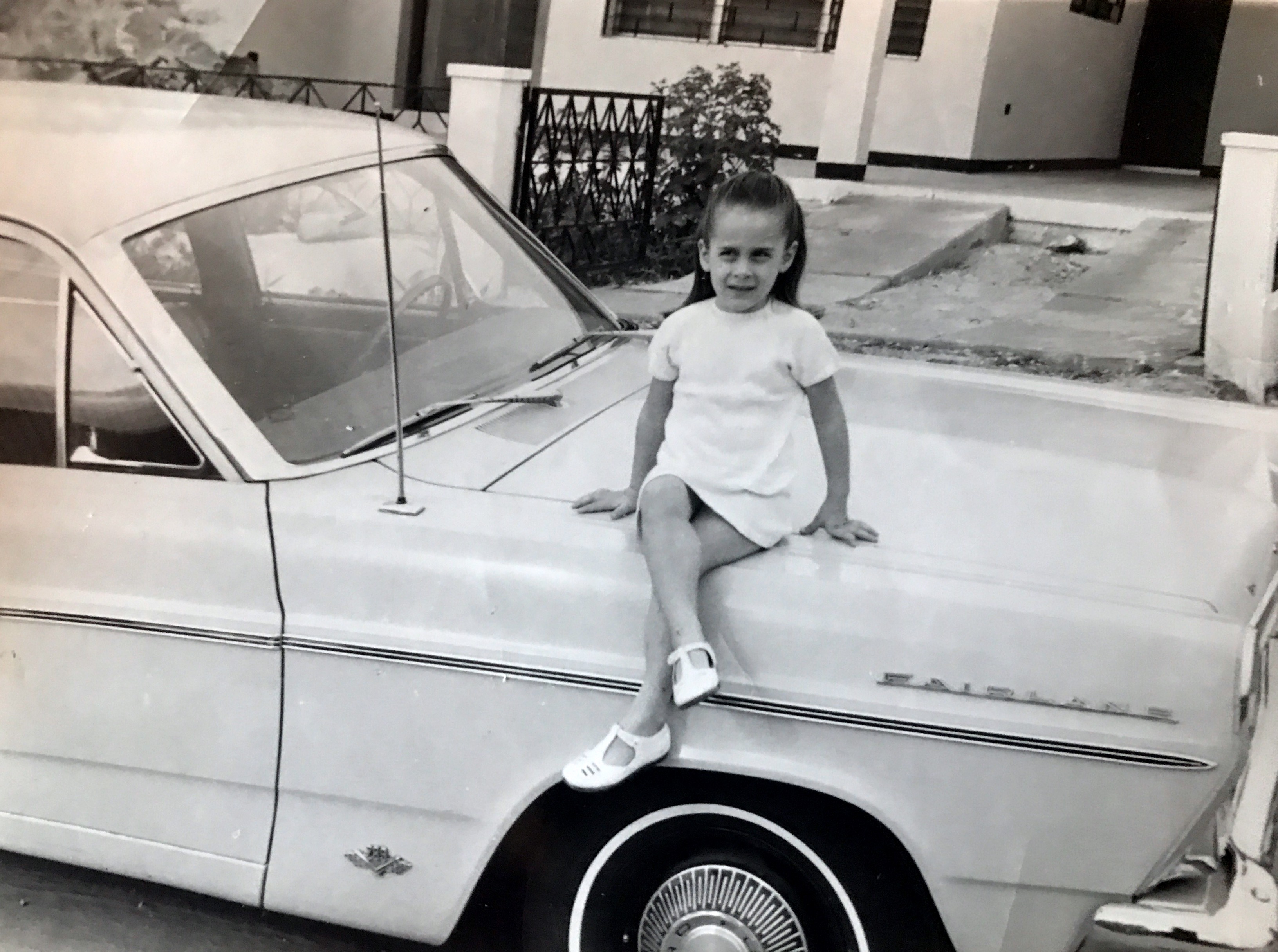 Carolina on Dad's car. 1967.