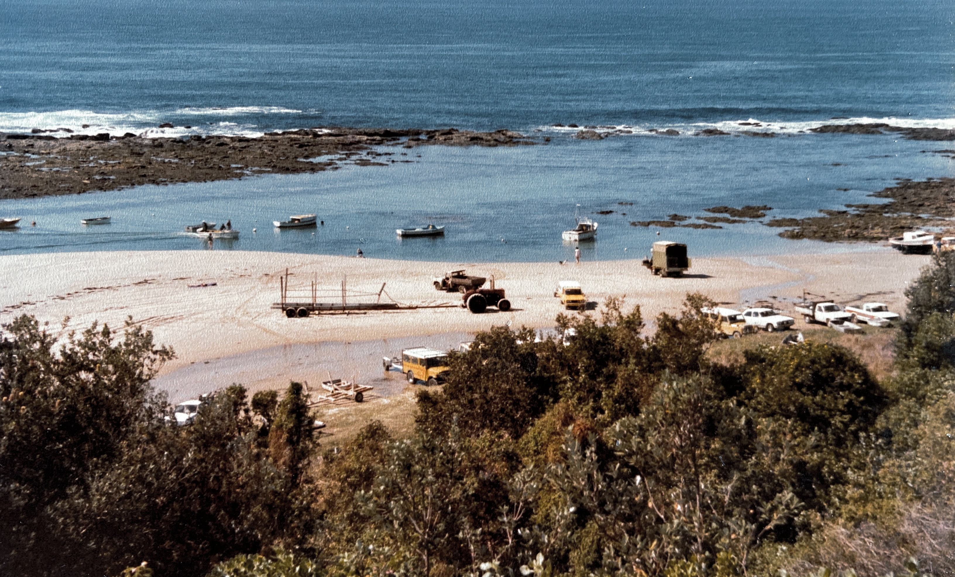Minnie Bay with licences fishing boats on anchor. 1984